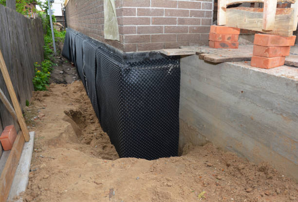 Happy homeowners after waterproofing job in Stratford